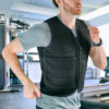 Man running in weighted black vest from Power WearHouse caption reads "Includes 2 sets of weights"