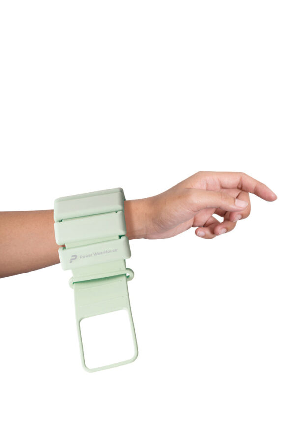 Adjustable weighted wrist weights shown threading though to form conformable lock for users