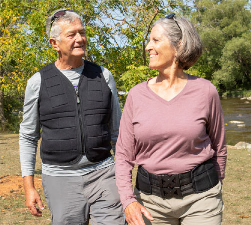 Couple walking with vest and belt